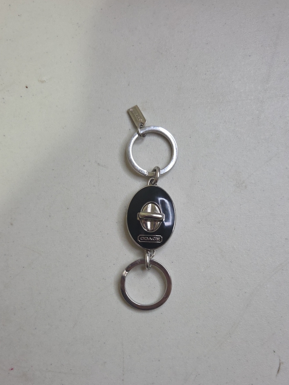 Coach Turnlock Valet Black Enamel Keyring